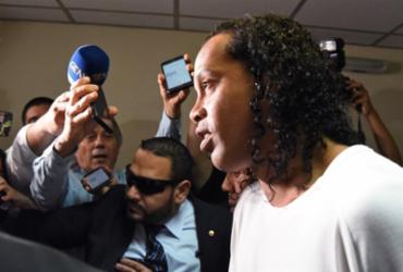 Ronaldinho irá a audiência para definição de reparação social no Paraguai | Norberto Duarte | AFP
