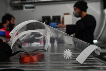 Pandemia do novo coronavírus relança a quarta revolução industrial | Aris Messinsis | AFP